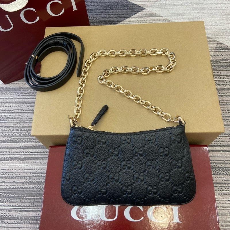 G*u*i top handle bags